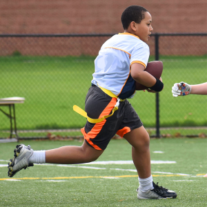 Flag Football Player With Football